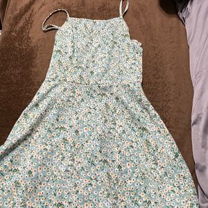 Pastel green dress with flowers